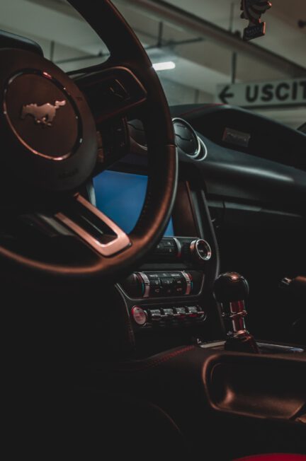 black and red steering wheel