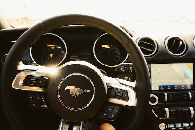 black and silver steering wheel